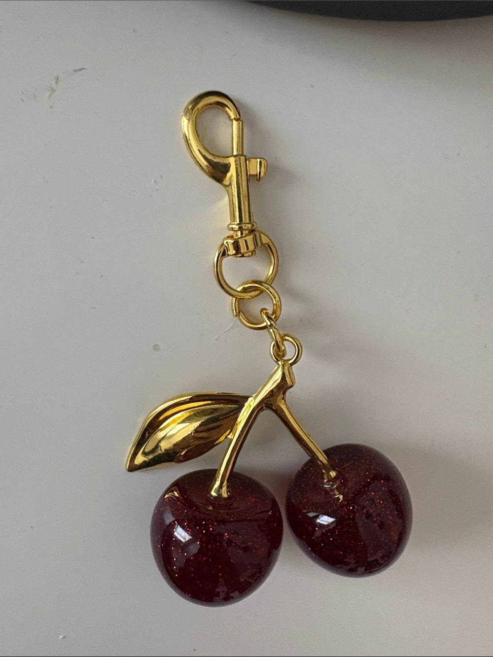 Coach Gold-tone Cherry Keychain with Dark Red Glitter Cherries